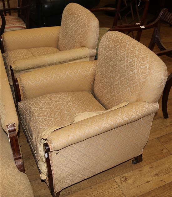 A pair of Edwardian inlaid mahogany armchairs